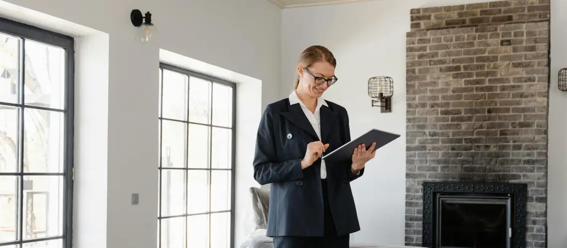 A professional property valuer assessing a home in Hobart
