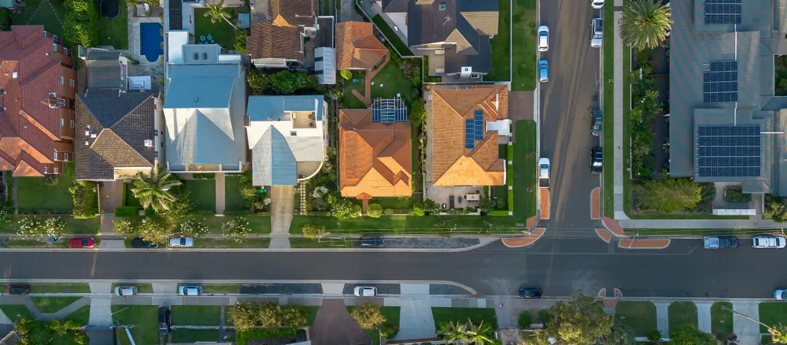 A property valuer assessing a home in Hobart